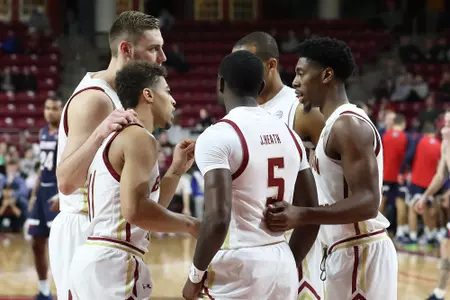 Boston College men's basketball huddles in-game