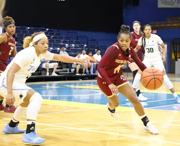 Sophomore Marnelle Garraud drive past a Tulane defender on Nov. 28, 2019.