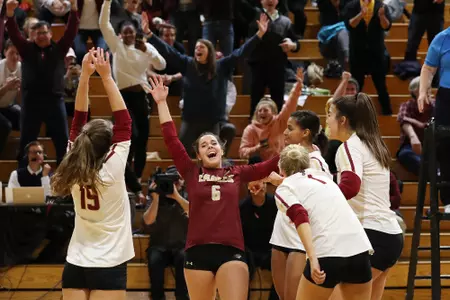 The volleyball team celebrates a win vs. NC State