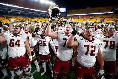 BC football players celebrate in front of their fans after a win over Pitt at Heinz Field.
