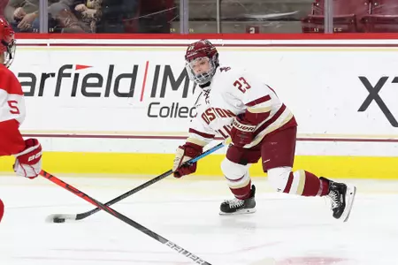 Cayla Barnes looks to shoot the puck against BU.