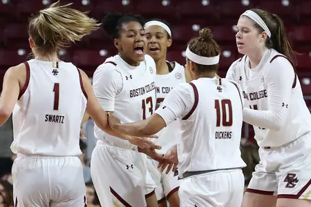 Cameron Swartz, Taylor Soule, Makayla Dickens and Emma Guy all celebrate after a run by the Eagles against VCU, Nov. 24, 2019.