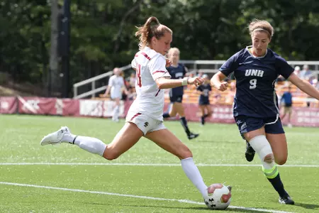 Olivia Vaughn looks to strike the ball against New Hampshire.