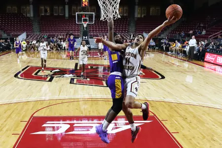 BC's Derryck Thornton drives the line vs. Albany