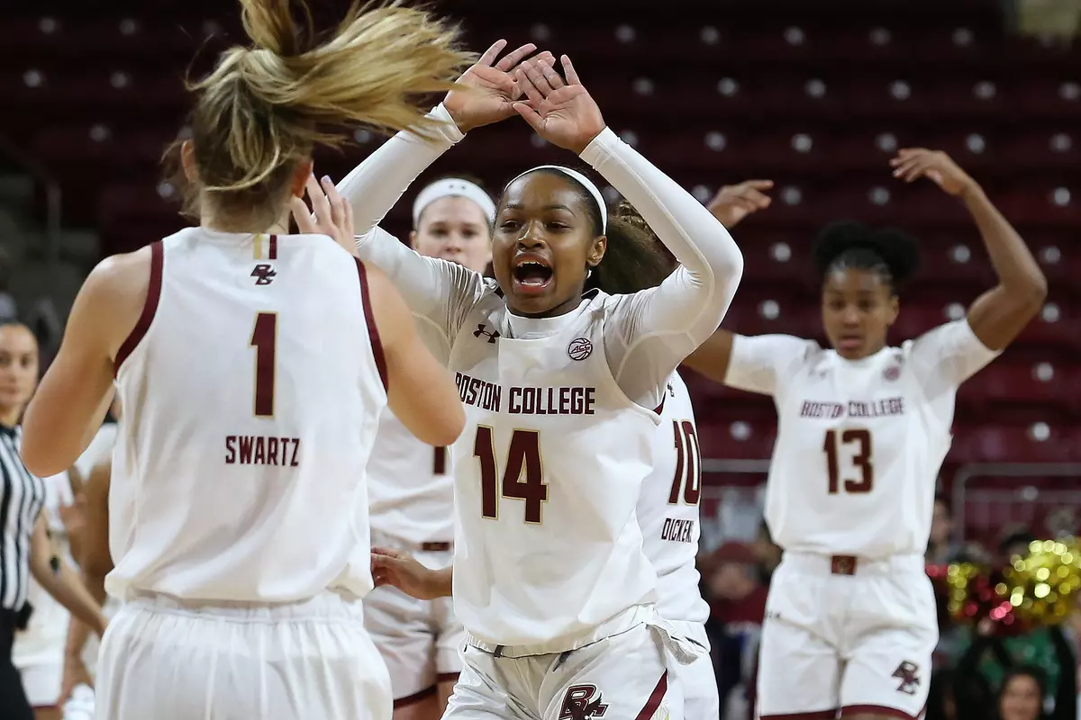 Marnelle Garraud celebrates with Cameron Swartz in the win over Delaware State on Dec. 20, 2019.