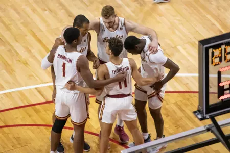 BC men's basketball huddles before the Northwestern game