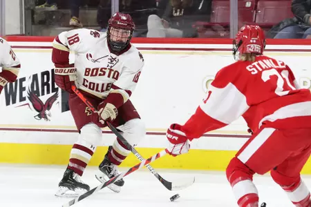 Kelly Browne skates the puck up the ice against BU.