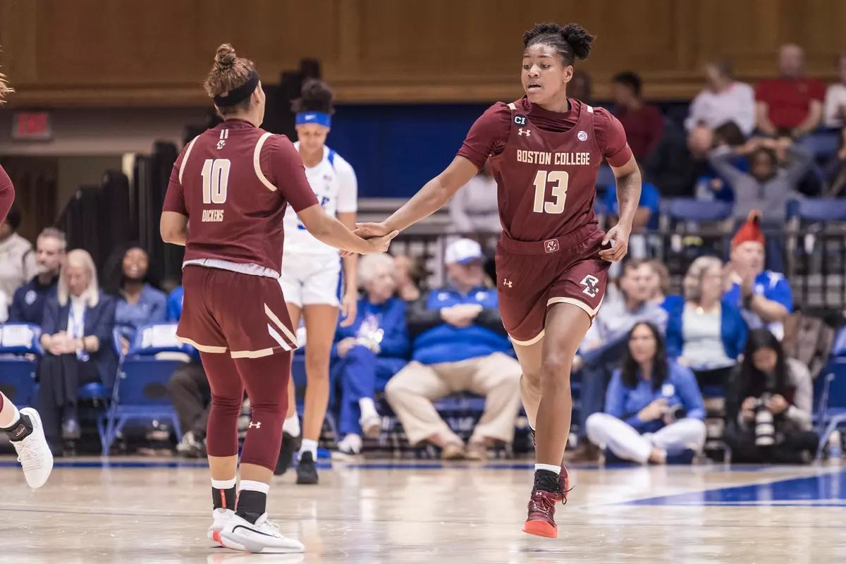 Taylor Soule gives Makayla Dickens a hand during the game vs. Duke on December 8, 2019.