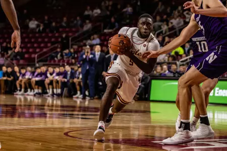 BC's Jay Heath drives the lane vs. Northwestern