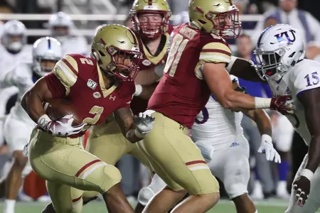 AJ Dillon runs right vs. Kansas