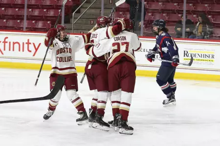 The Eagles celebrate a goal against UConn.