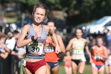 Emeline Delanis running to the finish line at the Coast-to-Coast Battle in Beantown