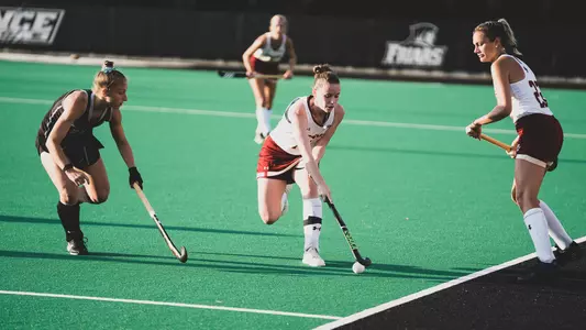 Brigid Wood protecting the ball against Providence