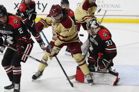Maegan Beres looks to tip the puck against Northeastern.