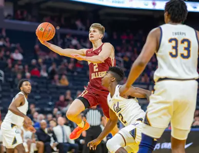 Julian Rishwain of Boston College scores vs. Cal