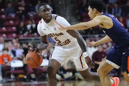 Jay Heath sets up the offense in the win over Virginia