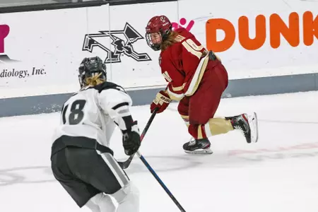 Hannah Bilka rushes the puck up the ice against Providence.