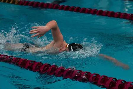 A men's swimmer at the Connell Center