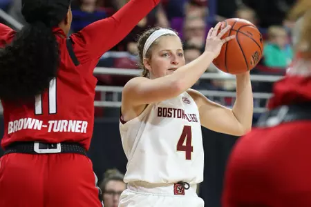Taylor Ortlepp looks to pass the ball inside vs. NC State on Dec. 29, 2019.