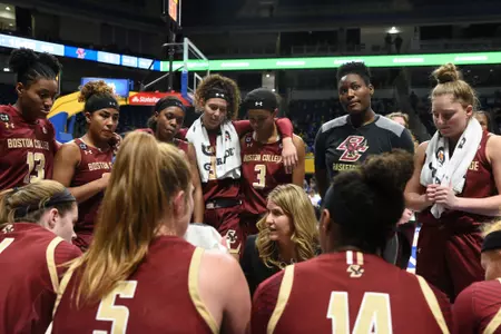 Coach Mac leads the huddle during the win over Pitt.