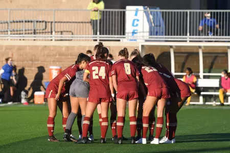 The Eagles huddle before taking on Pitt.
