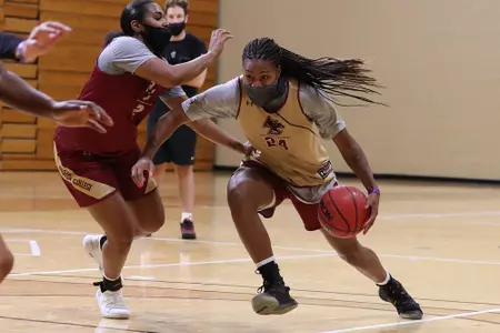 Taylor Soule drives to the basket against Kaylah Ivey in the Eagles first official practice in 2020.