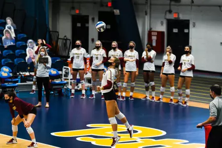 Bridget Green serves at Pitt