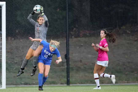 Allie Augur makes a save against Duke.