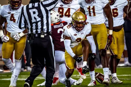 Jason Maitre celebrates a sack at Virginia Tech