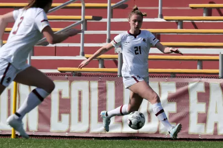 Riley Lochhead carries the ball up the field against UNC.