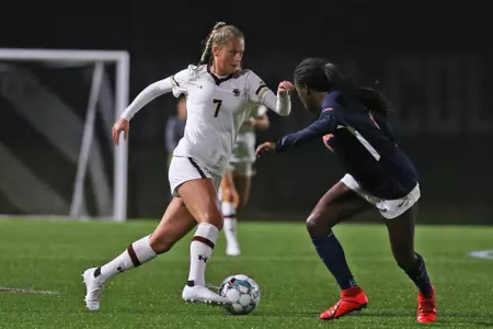 Zoie Allen takes on a defender while playing Virginia.