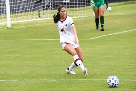 Sam Agresti kicks the ball in a game against Louisville.