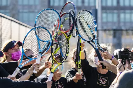 Tennis rackets together as a team