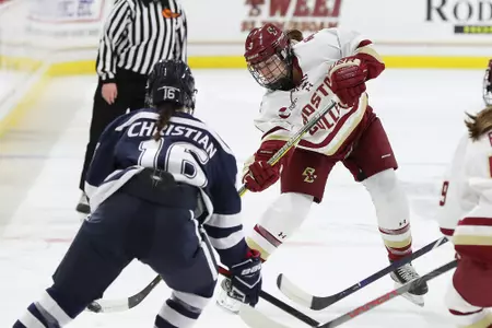 Deirdre Mullowney shoots the puck against UNH.