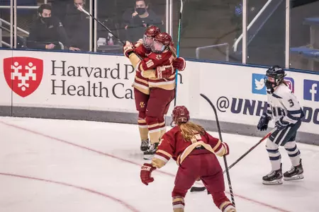 The Eagles celebrate a goal against UNH.