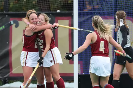 Elizabeth Warner and Margo Carlin celebrating a goal