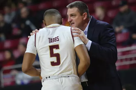 Head coach Jim Christian and guard Wynston Tabbs