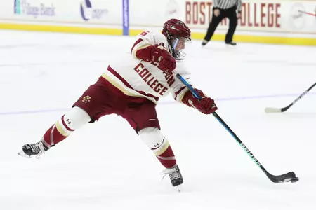 Alexie Guay shoots the puck against UNH.