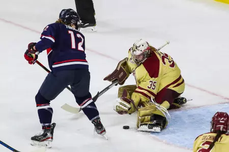 Maddy McArthur makes a save against UConn.