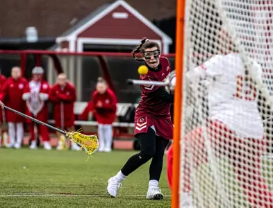 Charlotte North shoots at the net at Boston University
