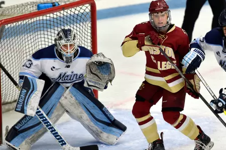 Maegan Beres fights for position in front of the net.