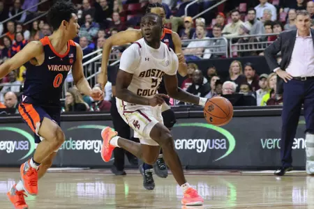 Jay Heath drives the lane against Virginia