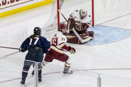 Maddy McArthur makes a save against UConn.
