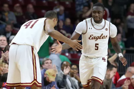Jay Heath and Steffon Mitchell dap it up against Virginia Tech