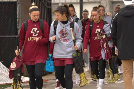 Kate Taylor and Sheila Rietano fist-bump ahead of the season opener