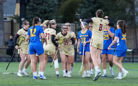 Jenn Medjid celebrates a goal with teammates against Hofstra
