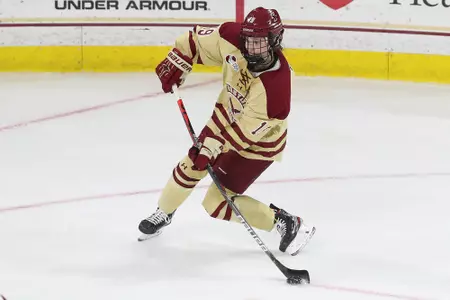 Hsnnah Bilka looks to shoot the puck against UConn.