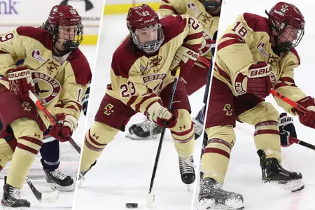Hannah Bilka (left), Cayla Barnes (middle), and Kelly Browne (right) skate up the ice against Northeastern.