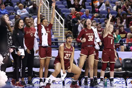 GA Jenny DeGraaf, Video Analyst Raegan Moore, Akunna Konkwo, Jaelyn Batts, Milan Bolden-Morris, Clara Ford, Sydney Lowery, Cameron Swartz celebrate on the bench, March 6, 2020.