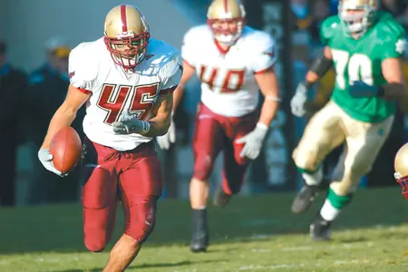 Josh Ott races to the end zone for a defensive score against Notre Dame.